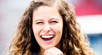 Laughing teenage girl with gorgeous smile